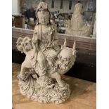 LATE 18THC REMAKE OF KWAN YIN SITTING ON A LION - WHITE PORCELAIN - 45 CMS (H) APPROX