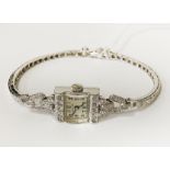 14CT WHITE GOLD & DIAMOND CLUSTER COCKTAIL WATCH IN THE ART DECO STYLE