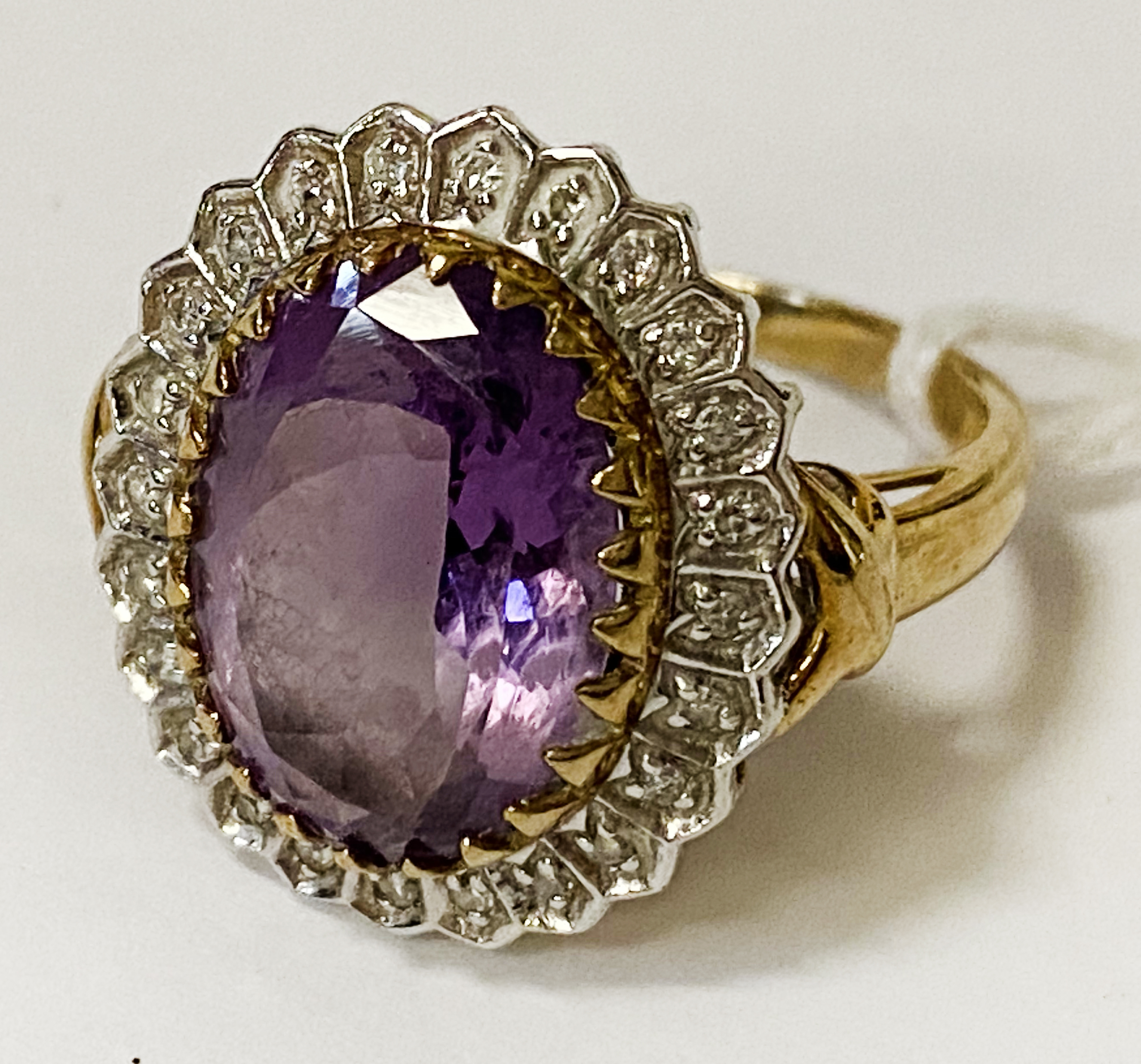 9CT GOLD OVAL AMETHYST RING WITH DIAMOND HALO SIZE N