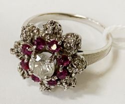 18CT WHITE GOLD SINGLE DIAMOND RING - 0.50CTS APPROX WITH RUBY HALO RING SIZE O