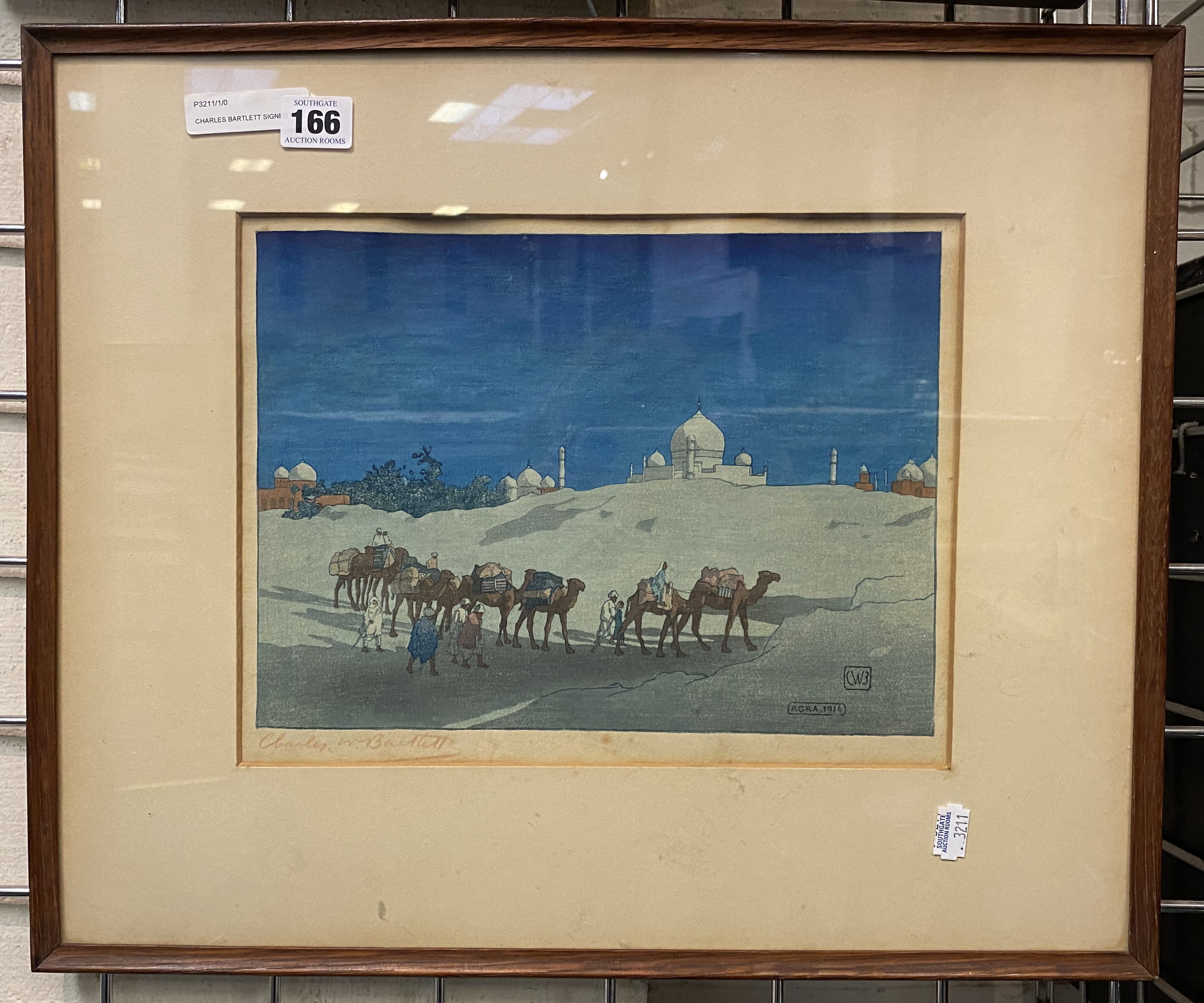 CHARLES BARTLETT SIGNED WOOD BLOCK CAMEL TRAIN IN AGRA 24CMS X 31CMS INNER FRAME SOME SLIGHT