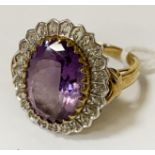 9CT GOLD OVAL AMETHYST RING WITH DIAMOND HALO SIZE N