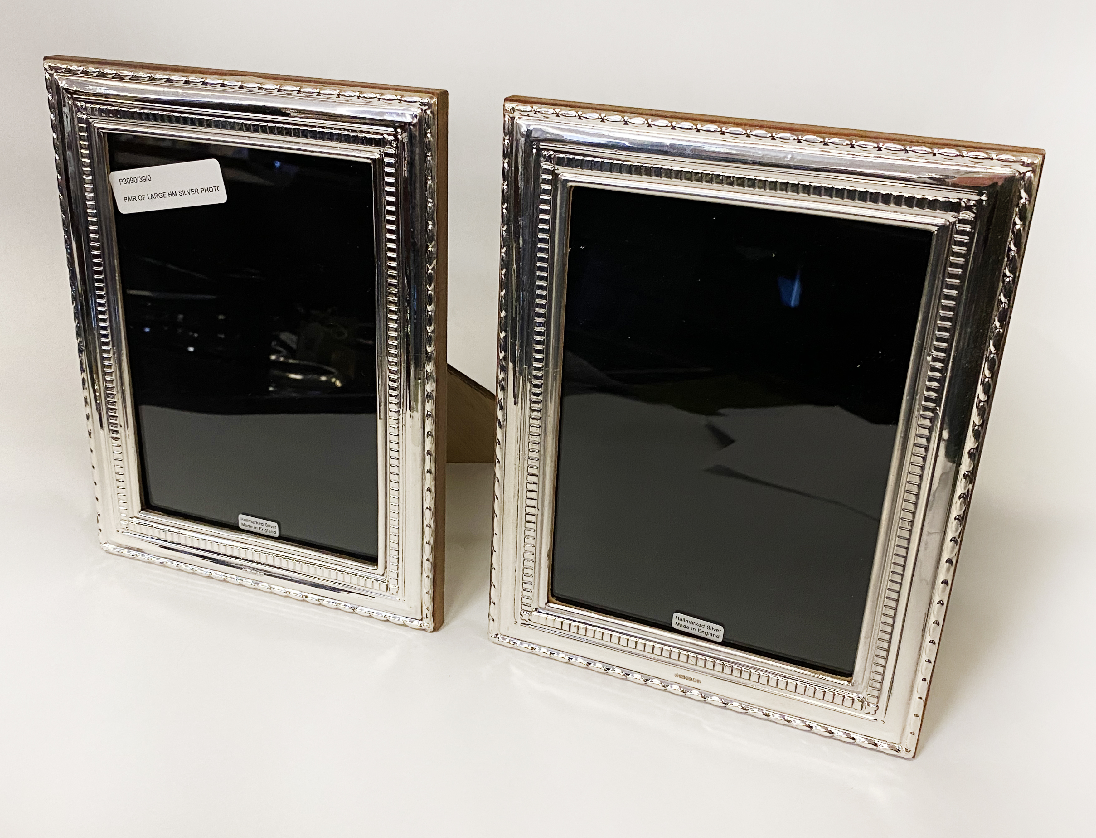 PAIR OF LARGE HM SILVER PHOTO FRAMES - 22 X 17 CMS