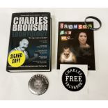 TWO SIGNED PRISONER CHARLES BRONSON SALVADOR BOOKS, PLUS SUPPORTERS WRIST BAND, CAR STICKERS &