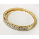 9CT GOLD DIAMOND ENCRUSTED BANGLE - APPROX 30 GRAMS