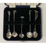 CASED SET OF JAPANESE SILVER FIGURAL SPOONS - 1.5 ozs APPROX