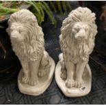 PAIR OF SMALL SEATED LIONS