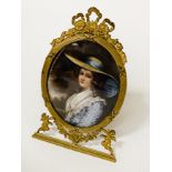 FRENCH PORTRAIT MINIATURE OF A LADY - IN BRASS FRAME