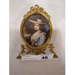 FRENCH PORTRAIT MINIATURE OF A LADY - IN BRASS FRAME - 14.5 CMS (H) APPROX