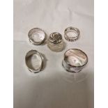 FOUR H/M SILVER NAPKIN RINGS & A SILVER TOPPED BOTTLE - 2.2 OZS APPROX