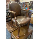 BROWN LEATHER CARVER CHAIR