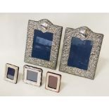 PAIR OF HM SILVER PHOTO FRAMES WITH 3 SMALL SILVER FRAMES