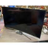 SAMSUNG CURVED SCREEN TV