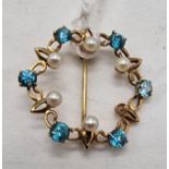 9CT GOLD & BLUE TOPAZ BROOCH - 3.9 GRAMS APPROX