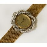 18CT GOLD LADIES OMEGA WATCH WITH DIAMOND SURROUND - 47.2 GRAMS APPROX TOTAL