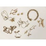 QTY OF GOLD ITEMS - 25 GRAMS APPROX The lot also includes a Monet gold-plated necklace and earrings