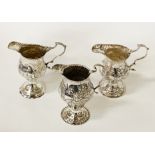 THREE GEORGIAN SILVER CREAM JUGS - 216 GRAMS APPROX - 11 CMS (H)