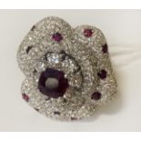 18CT WHITE GOLD RING - CENTRE STONE NATURAL RUBY,APPROX 1CT DIAMOND - TOTAL BETWEEN 4-5 CARATS- SIZE