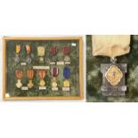 CASED DISPLAY OF BELGIAN MEDALS SOME WITH SILVER CONTENT