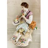SITZENDORF FIGURE OF A BOY WITH BIRDS - 13 CMS (H) APPROX