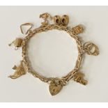 9CT CHARM BRACELET 26 GRAMS APPROX