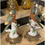 PAIR OF RED BRONZE & PORCELAIN PARROT CANDLESTICKS 35.5CMS (H) APPROX