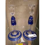 PAIR OF BLUE CUT GLASS CANDLESTICKS - 24 CMS (H) APPROX