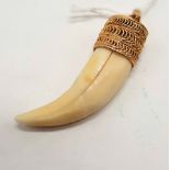GOLD TOOTH PENDANT
