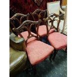 FOUR ROSEWOOD DINING CHAIRS