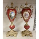 PAIR OF RED NAO CLASSICAL URNS