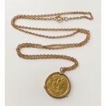 22CT GOLD HALF SOVEREIGN WITH 9CT GOLD CHAIN AND MOUNT C1908 9.7 GRAMS TOTAL APPROX