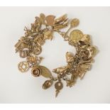 9CT GOLD CHARM BRACELET - APPROX 51.1 GRAMS