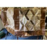 TWO COW HIDE RUGS - 1 CIRCULAR & 1 SQUARE