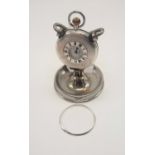 HM SILVER HALF HUNTER POCKET WATCH ON METAL STAND WITH A METAL BEZEL