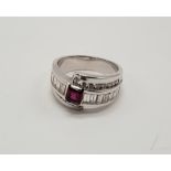 18CT GOLD RUBY & DIAMOND CROSSOVER RING - SIZE K