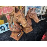 PAIR OF CAST IRON HORSE HEADS