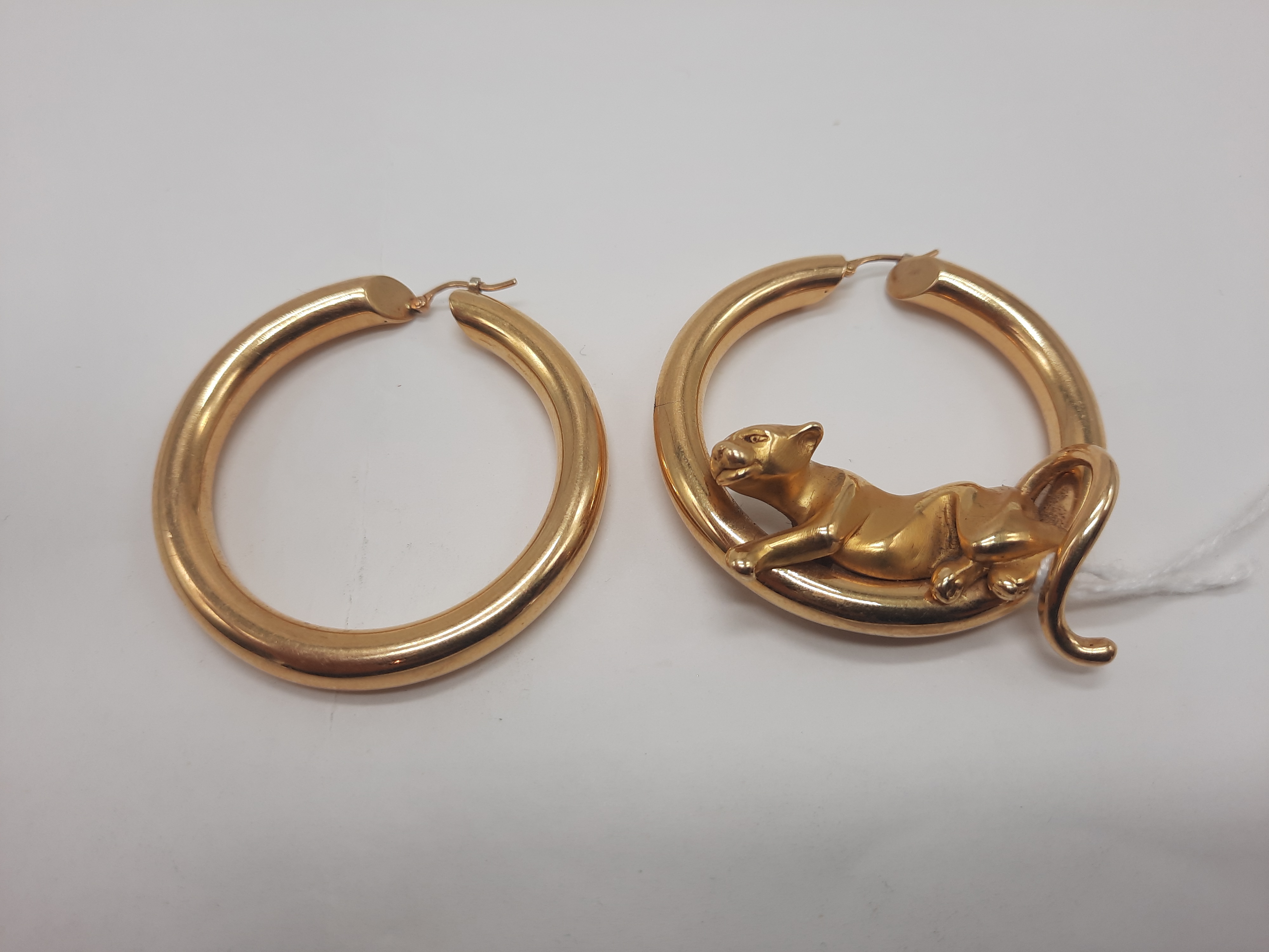 PAIR OF 9CT GOLD EARRINGS WITH A LIONESS SET IN ONE 14.9 GRAMS APPROX