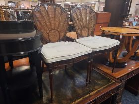 TWO BERGERE PEACOCK CHAIRS