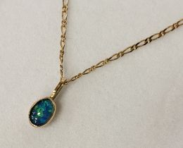 BLACK OPAL ON A 9CT GOLD ANKLE CHAIN