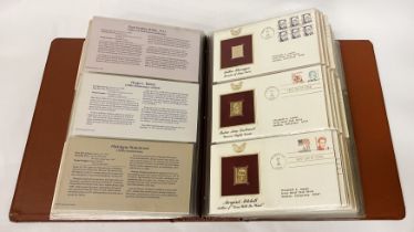 GOLDEN REPLICAS OF US STAMPS - ALBUM OF APPROX 42 PROOF REPLICAS ON 22CT GOLD