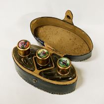 ENAMELLED TOPPED BOTTLE SET IN LEATHER BOX