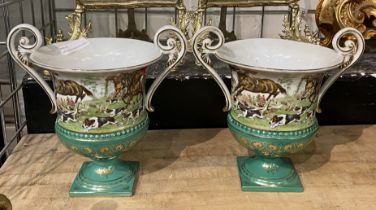 PAIR GREEN PORCELAIN HUNTUNG SCENE URNS - 23.5CMS (H) APPROX