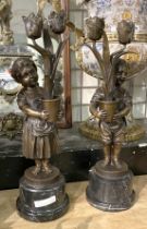 PAIR OF BRONZE BOY & GIRL CANDLESTICKS 47.5CMS (H) & 49.5CMS APPROX