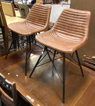 PAIR OF TAN LEATHER INDUSTRIAL CHAIRS