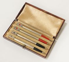 CASED SET OF FOUR SILVER BRIDGE PENCILS