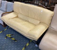 YELLOW LEATHER SOFA ON CHROME LEGS