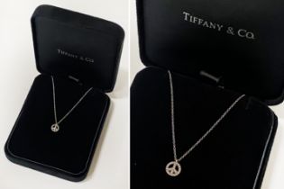 TIFFANY 18 CARAT WHITE GOLD & DIAMOND PENDANT ''PEACE SYMBOL'' ON CHAIN