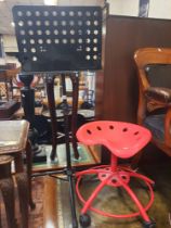 MUSIC STAND & RED STOOL ON WHEELS