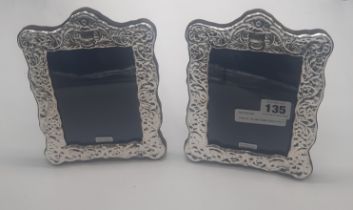 PAIR OF SILVER EMBOSSED PHOTO FRAMES 19CMS X 15CMS
