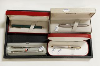 FOUR BOXED SHEAFFER PENS